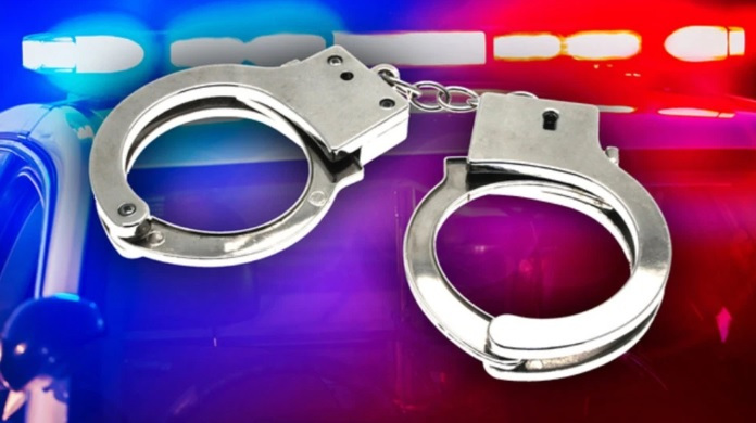 Handcuffs-hand-cuffs-arrested-in-custody.jpg