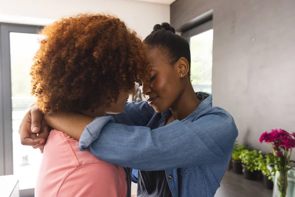 depositphotos_667804860-stock-photo-romantic-diverse-couple-aprons-embracing.webp