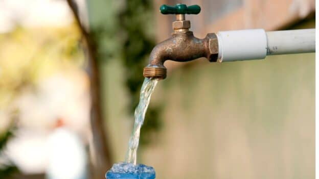 catching_water_at_a_pipe_-e1719353892406.jpg