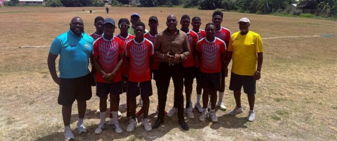 The-Hon.-Daryll-Matthew-Minister-of-Education-Sports-and-Creative-Industries-and-team-e1751392440373.jpeg