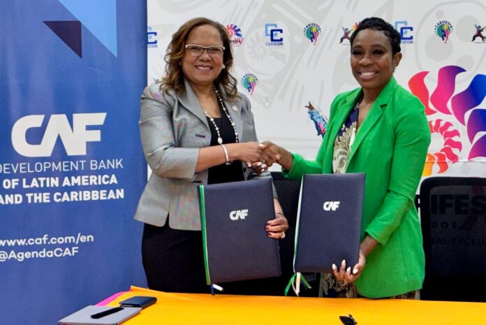 CAF-Carifesta-Signing-2-scaled-e1755536635248.jpg