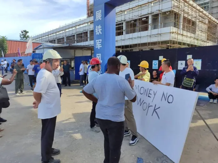 Chinese-workers-in-St-James-strike-in-protest-citing-wage-discrepancies-.jpg.webp