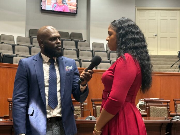 Maria-Browne-being-interviewed-by-reporter-from-ABS-Photoby-Maurice-Merchant.jpg