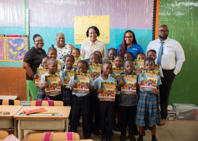 ECAB-Staff-with-Grade-2-Teachers-and-Students-at-Urlings-Primary-School-scaled.jpg
