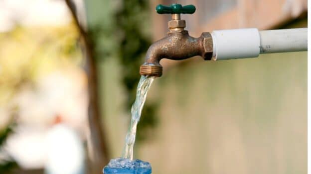 catching_water_at_a_pipe_-e1719353892406.jpg