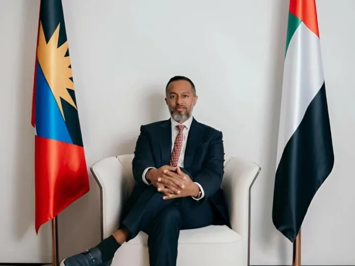 Ambassador-Theon-Ali-poses-for-a-photograph.-.webp