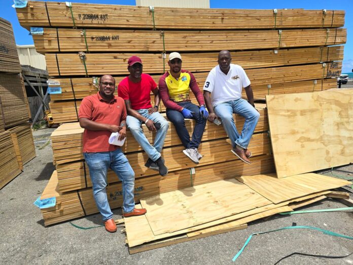 MPs-with-building-materials.jpg