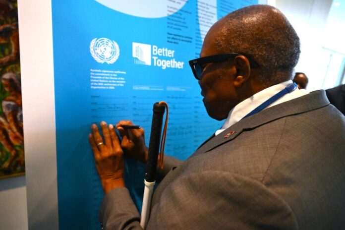 Ambassador-signing-scaled-e1782137083216.jpg