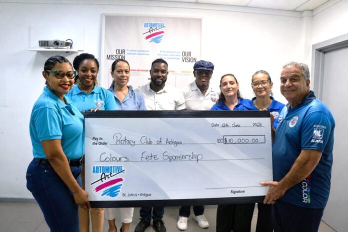 Colours-cheque-presentation-at-Automotive-Art-e1781474508439.jpg